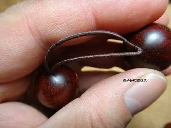 紫檀佛塔打结,小叶紫檀手串侧挂佛头打结方法