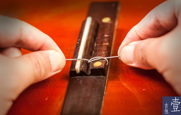 北航吉他,如何换吉他新弦