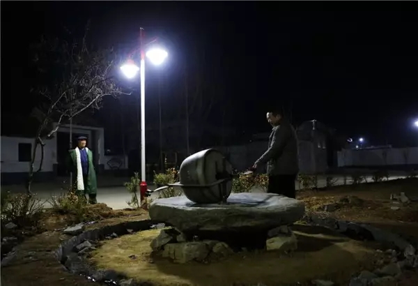 触“电”，一个国家级贫困村的两年之变