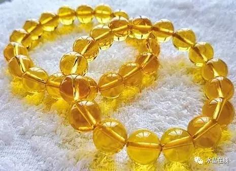 黄水晶千手观音吊坠真假,纯净体黄水晶怎么辨别真假