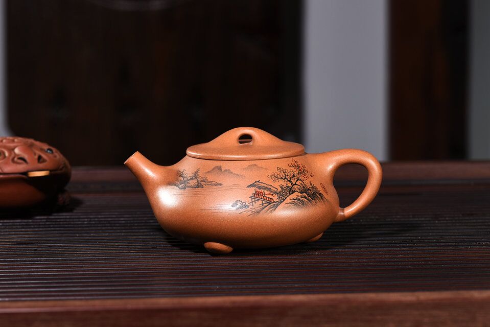 紫砂壶出水不畅怎么解决,紫砂壶压住盖子会出水不