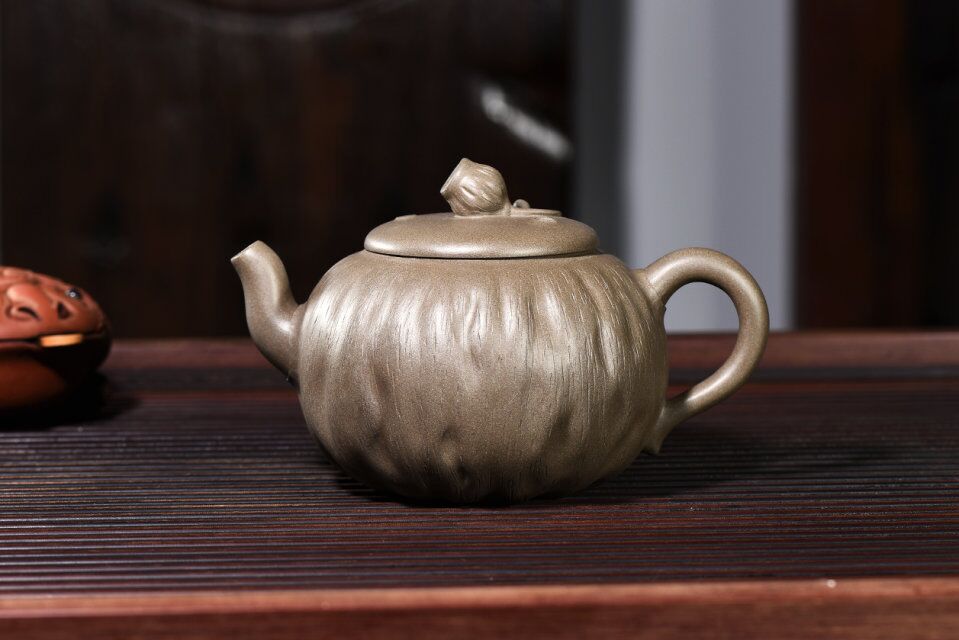 紫砂壶出水不畅怎么解决,紫砂壶压住盖子会出水不