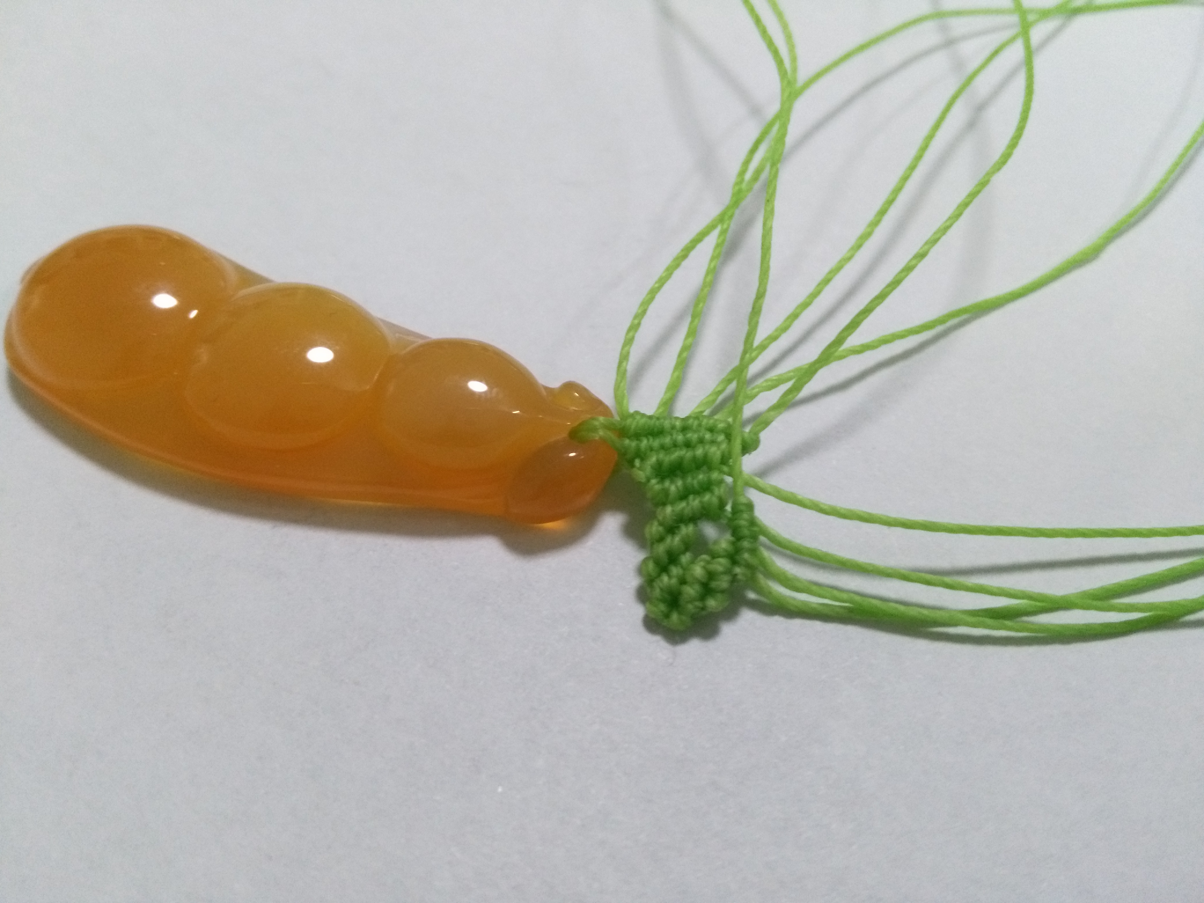 玛瑙豆子编手机吊坠法教程,玉豌豆吊坠怎么编绳