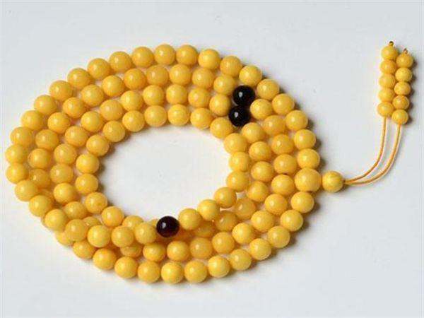 鉴别鸡油黄蜜蜡真假的最简单方法,鸡油红蜜蜡与鸡油黄蜜蜡哪种好