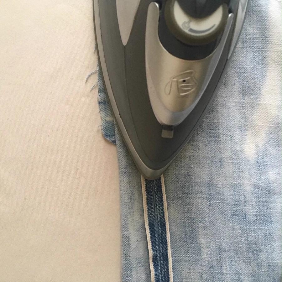 牛仔裤的膝盖烂了怎样补,牛仔裤的膝盖烂了怎么拿线缝