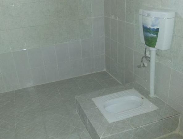 蹲便器为什么会抬高,卫生间装蹲便器必须抬高地面吗