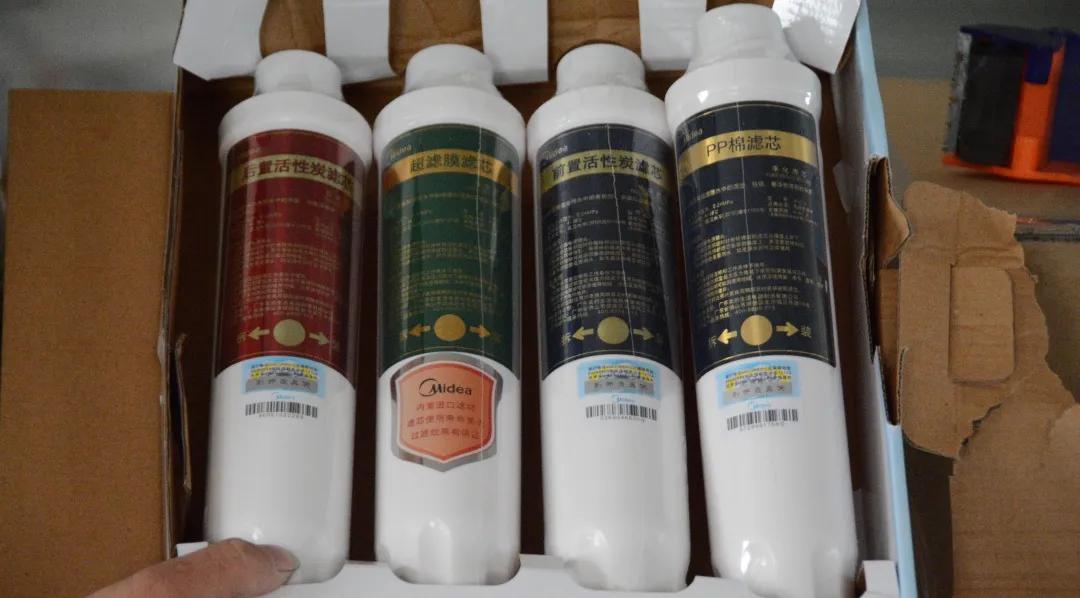 美的净水器造假案,315曝光美的净水器滤芯打假
