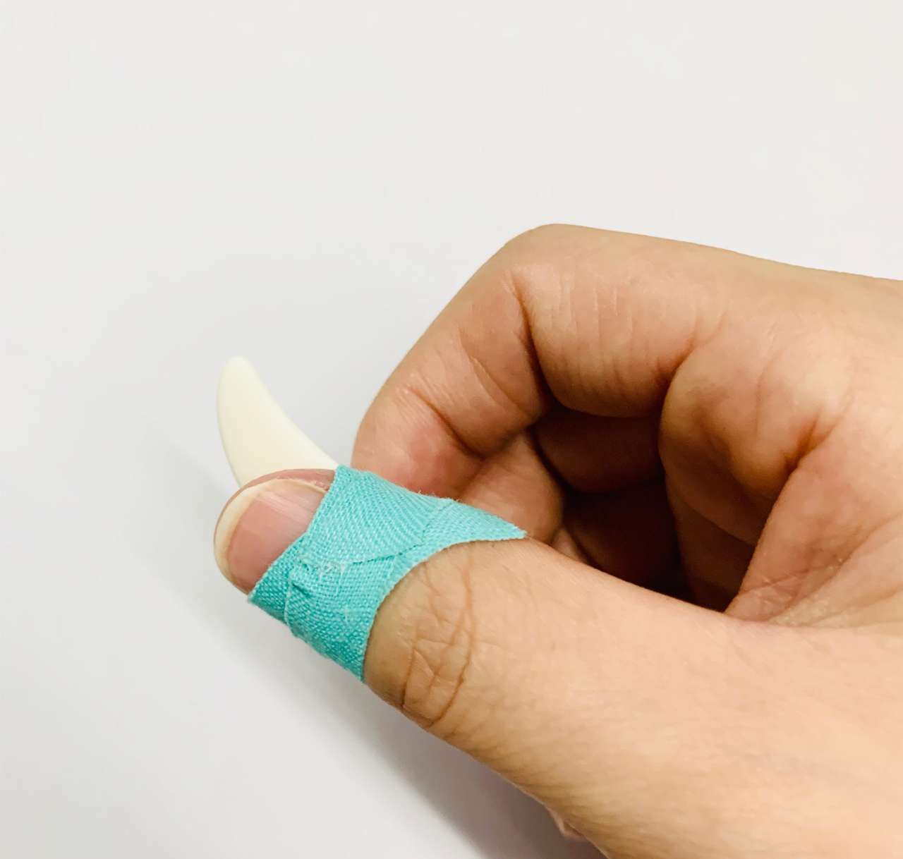 古筝戴假指甲的正确戴法,古筝假指的正确戴法