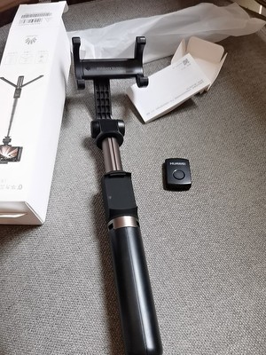 华为三脚架自拍杆af15怎么用,华为有线自拍杆的使用方法及操作