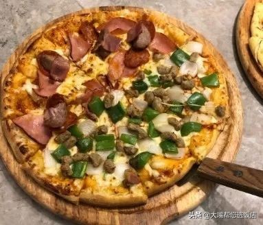 #吃遍大连#披萨的诱惑!一个蕴藏着芝士力量的神物