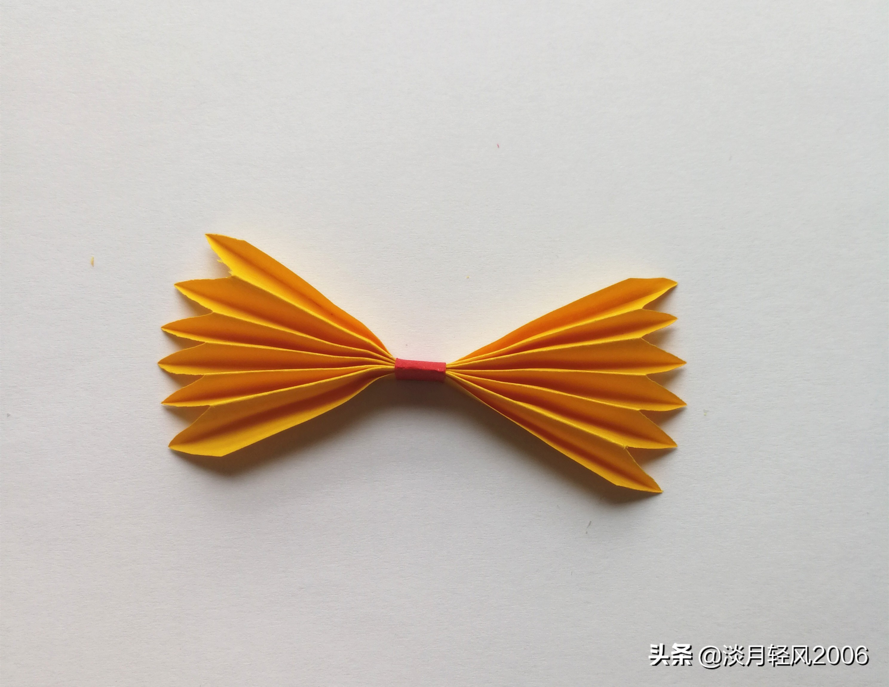 不需要剪刀用卡纸怎么做蝴蝶结,长方形卡纸蝴蝶结怎么折慢教程