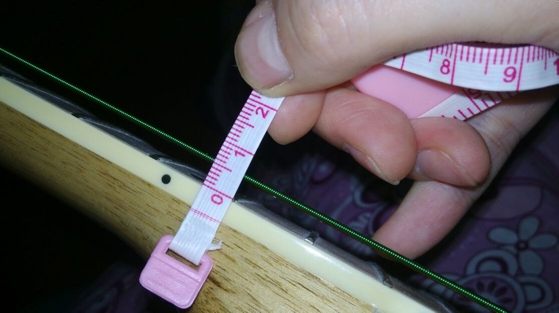 新手弹吉他发现手很疼你的琴可能需要调整了