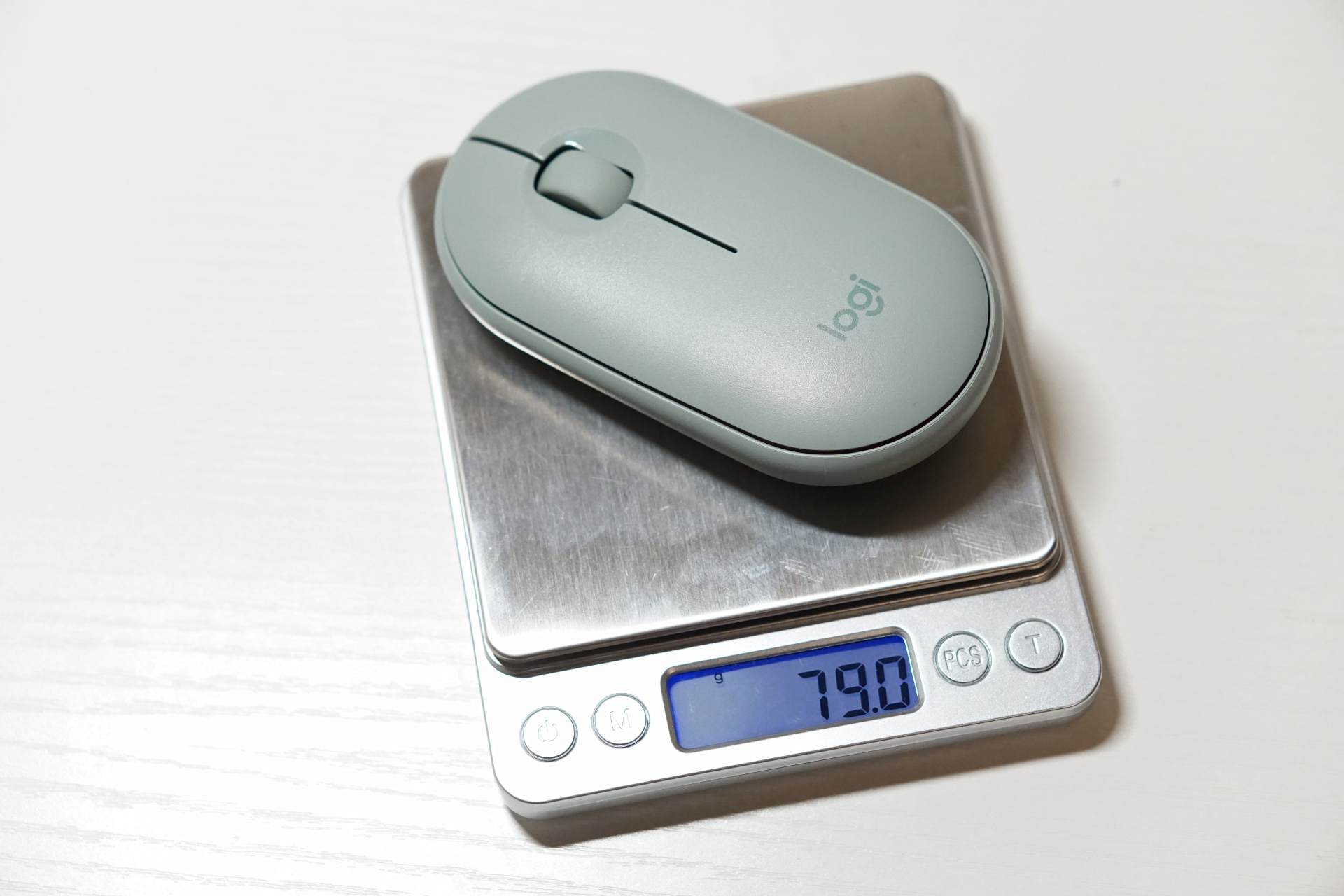 罗技无线鼠标pebble怎么切换蓝牙,罗技鼠标pebble如何连ipad