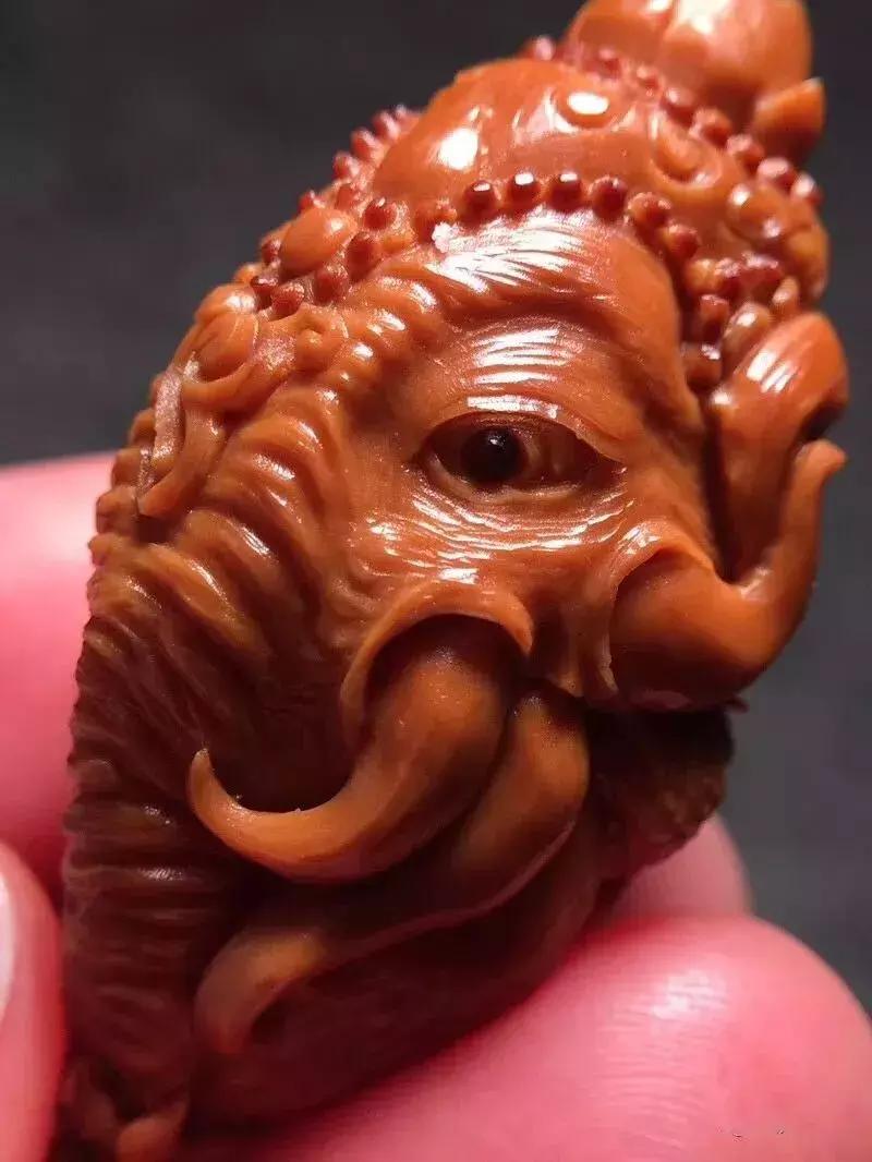 拿到一串橄榄核雕，不用只知道说“卧槽，真好看”了