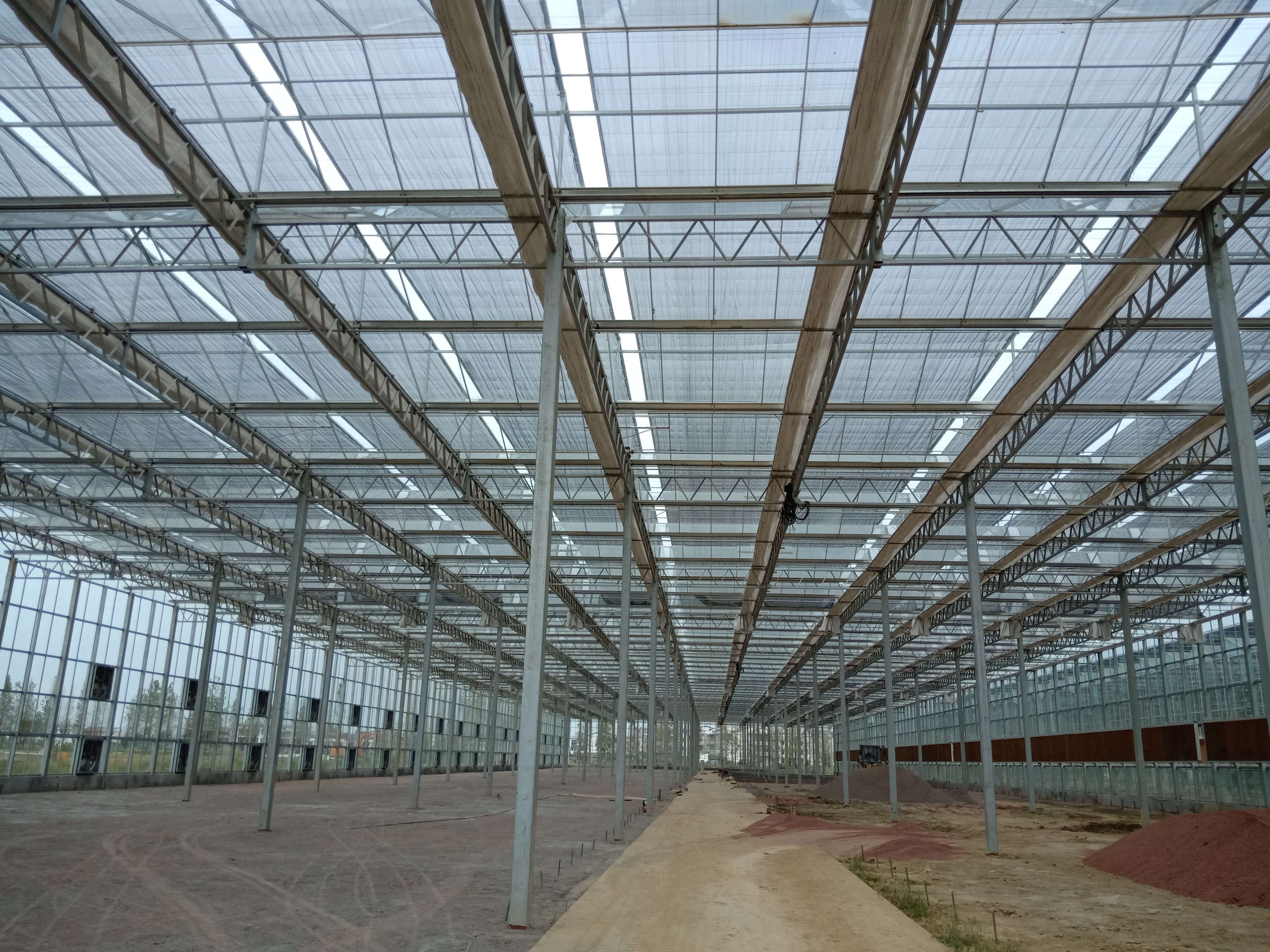 单栋温室大棚建设造价多少钱,连栋温室大棚造价多少钱一平