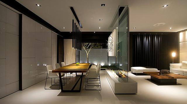 用砖砌出来的电视背景墙效果,砌的像窗户一样的电视墙