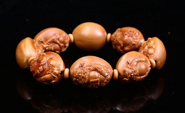 橄榄手串盘花,橄榄核雕手串盘花了怎么办视频