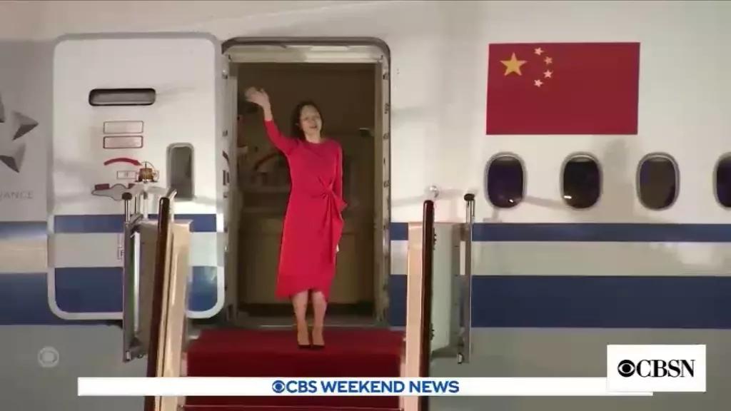 港媒评孟晚舟回国直播现场,孟晚舟回国视频获4亿赞