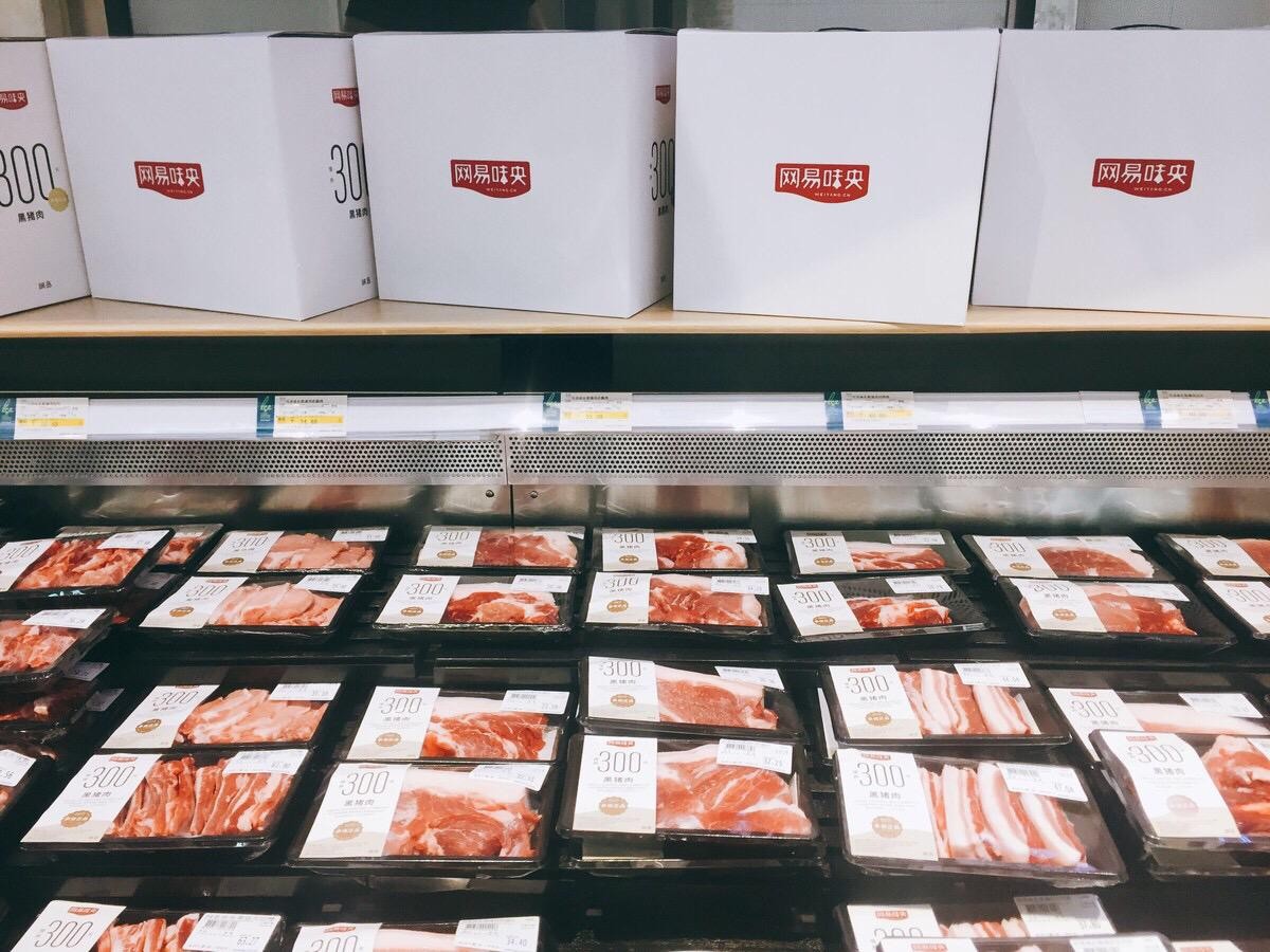 网易味央猪公司架构,网易味央黑猪基地