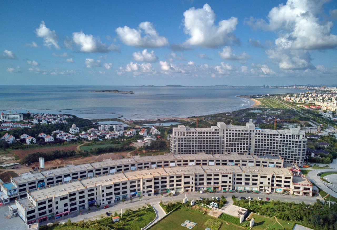 乳山银滩候鸟生活,乳山银滩哪里有鬼城