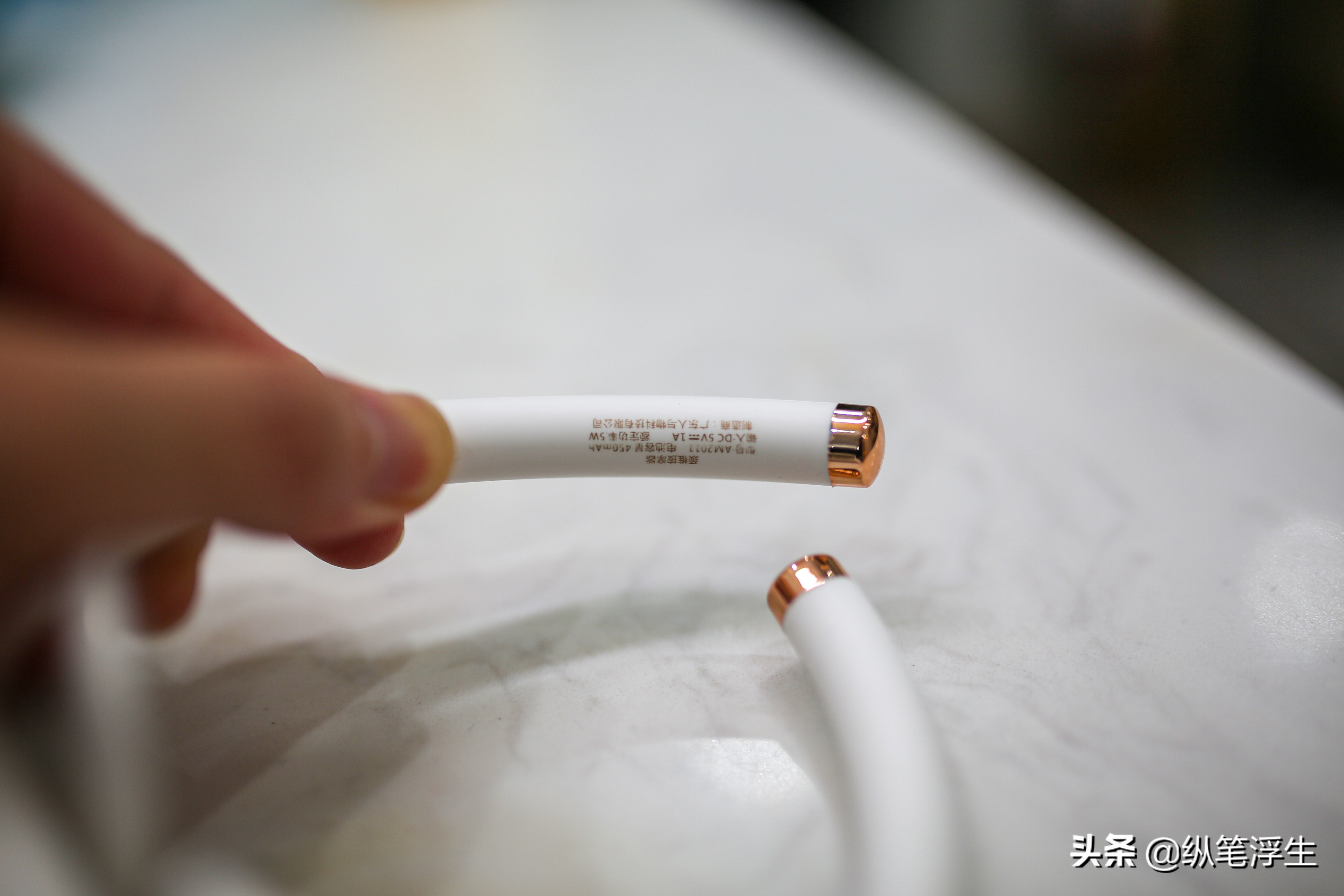 电脉冲、热敷按摩*管双**齐下：人与物AM2011颈椎按摩器测评