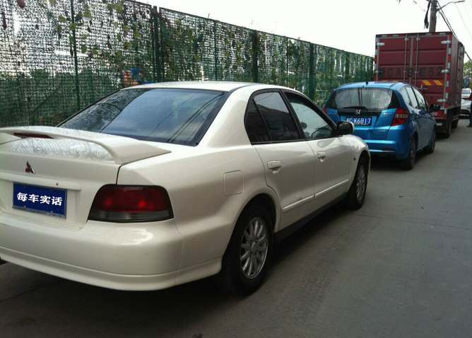 三菱戈蓝老款图片,三菱戈蓝八代鲨鱼头内饰