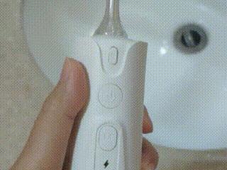 冲牙器便携式测评,冲牙器能多干净