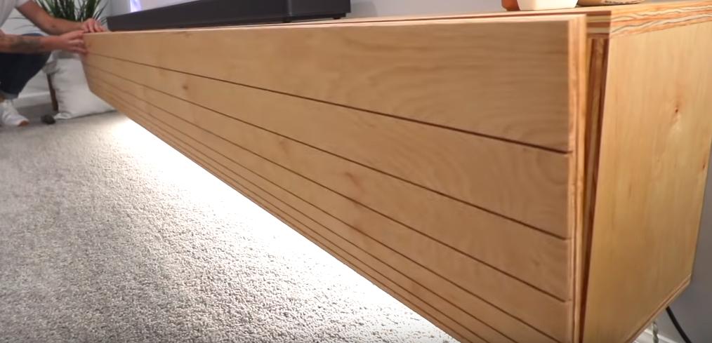 电视柜加隐形柜门一体效果图,悬空电视柜中间不做柜门好看吗