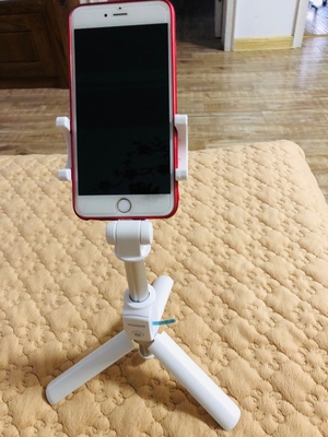 华为有线自拍杆的使用方法及操作,华为手机用自拍杆的使用方法图解