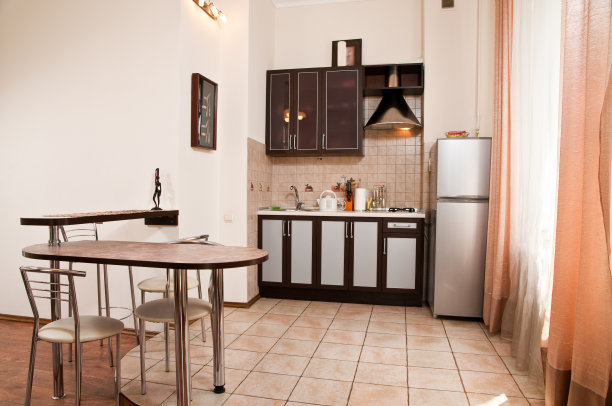 冰箱用了十多年了现在结冰厉害,冰箱后面有臭味储水盒怎么拿下来