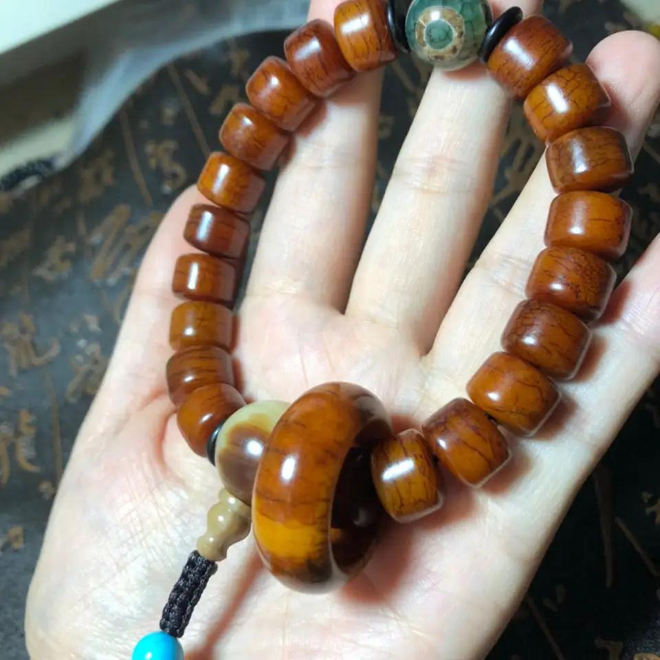 男人能不能佩戴鸡血石手串,文玩手串可以随便戴吗