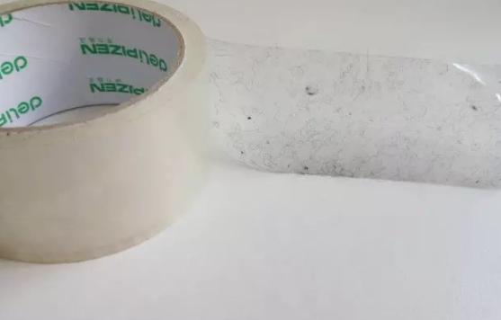 黑色衣服粘毛怎么处理小技巧,衣服粘毛小技巧