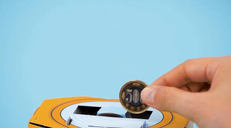 日本儿童杂志赠品胖虎存钱筒，把硬币投下去每次都有胖虎弹出来