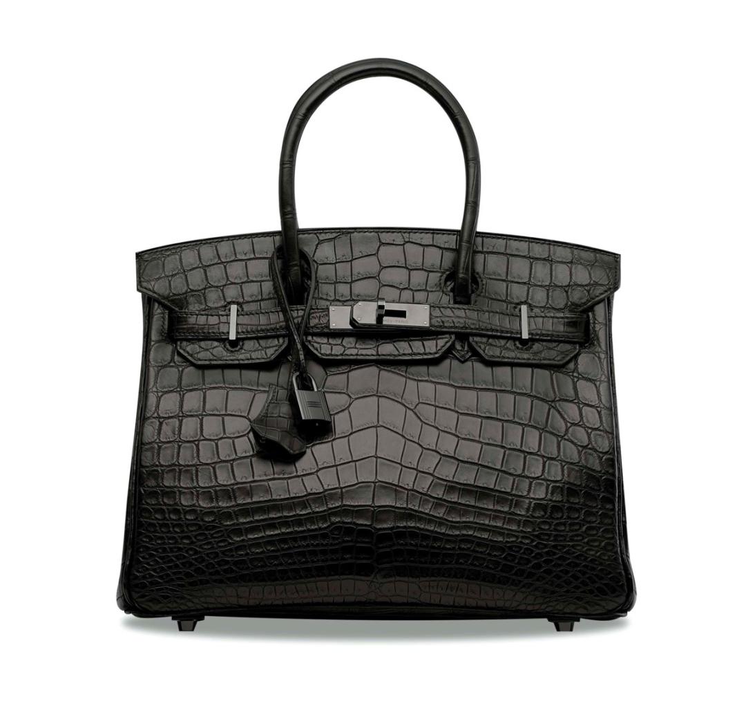 刘銮雄拍卖77个奢侈品包包,刘銮雄拍下的珠宝