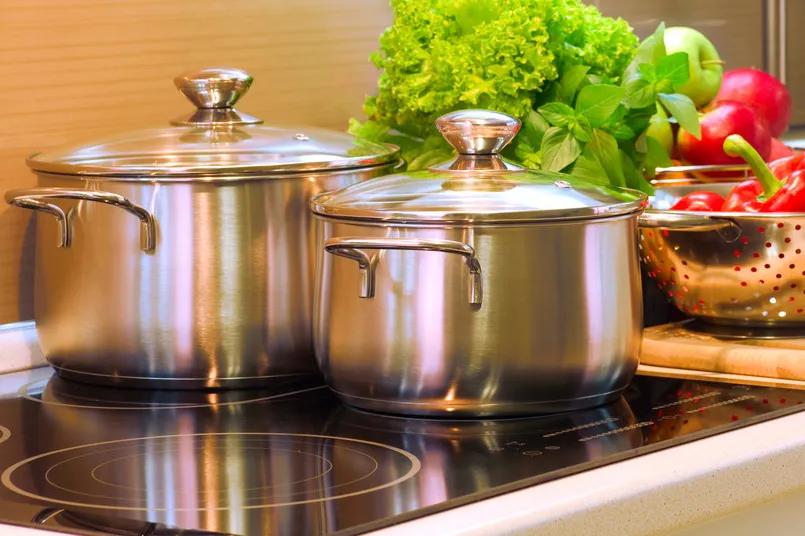 不粘锅炒锅和传统铁锅哪个好,不锈钢炒锅不粘锅哪个好