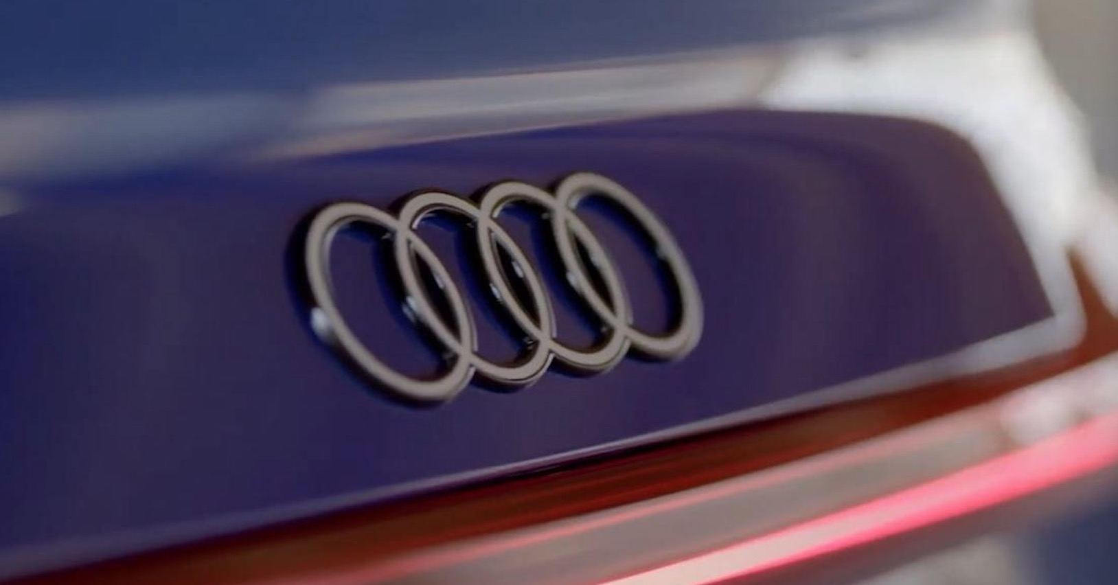 奥迪logo发光,奥迪换新标logo