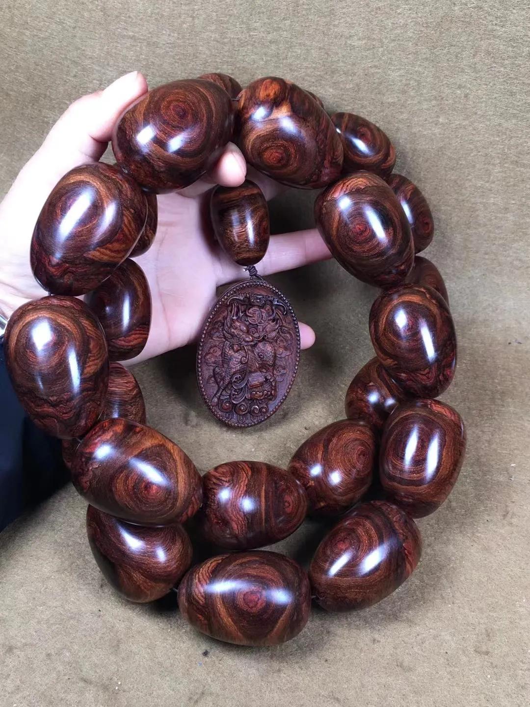 几百块一串的海南黄花梨手串,1.0的108串海南黄花梨手串配饰图片