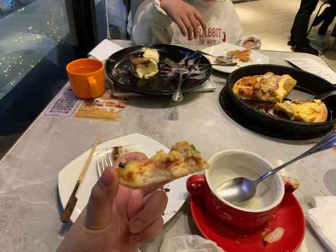 必胜客的母公司,必胜客采取了什么战略