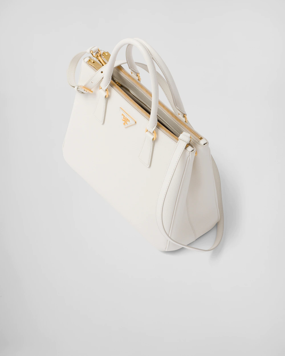 prada锯齿蓝黄拼色包,prada2022