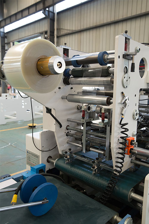 安庆永华贴窗机设备,安庆永华机械全自动贴窗机