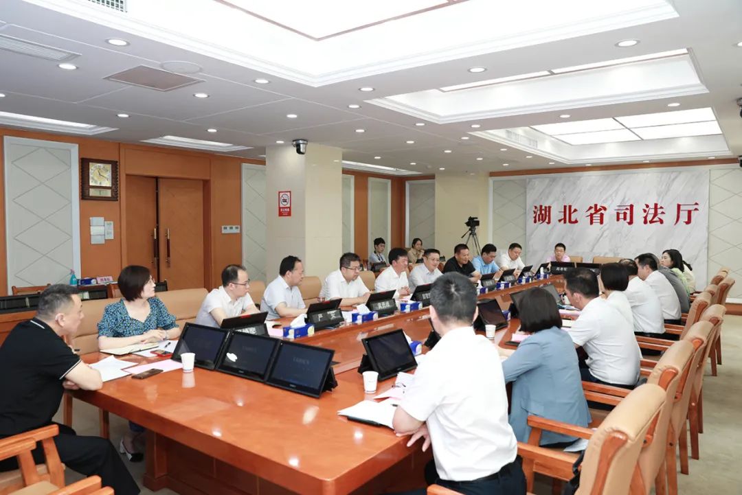 共商加强法治共同体建设推动行政争议实质性化解——游劝荣院长一行走访湖北省司法厅