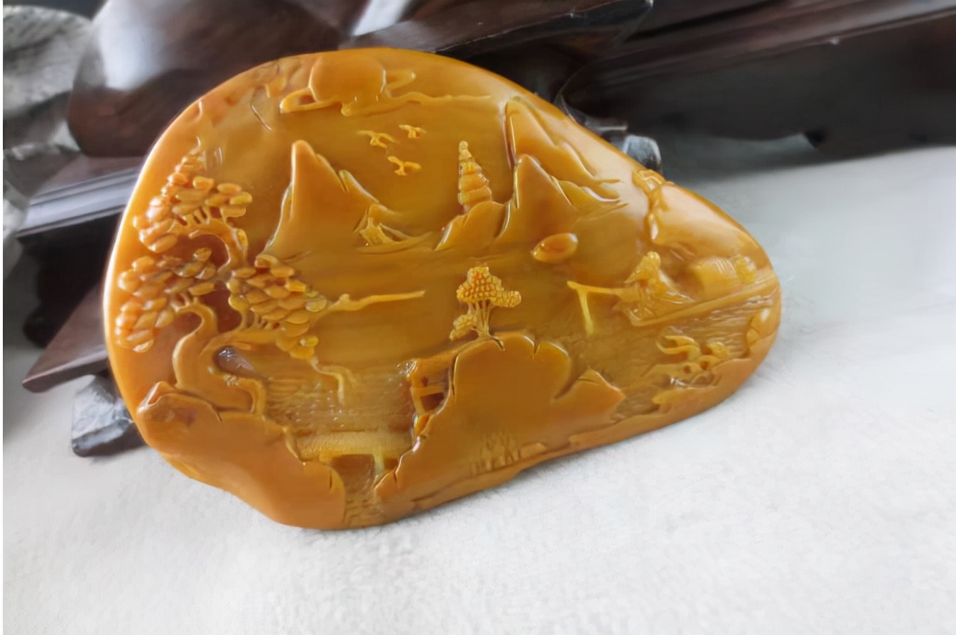 黄龙玉珠宝市场,玉石新贵黄龙玉