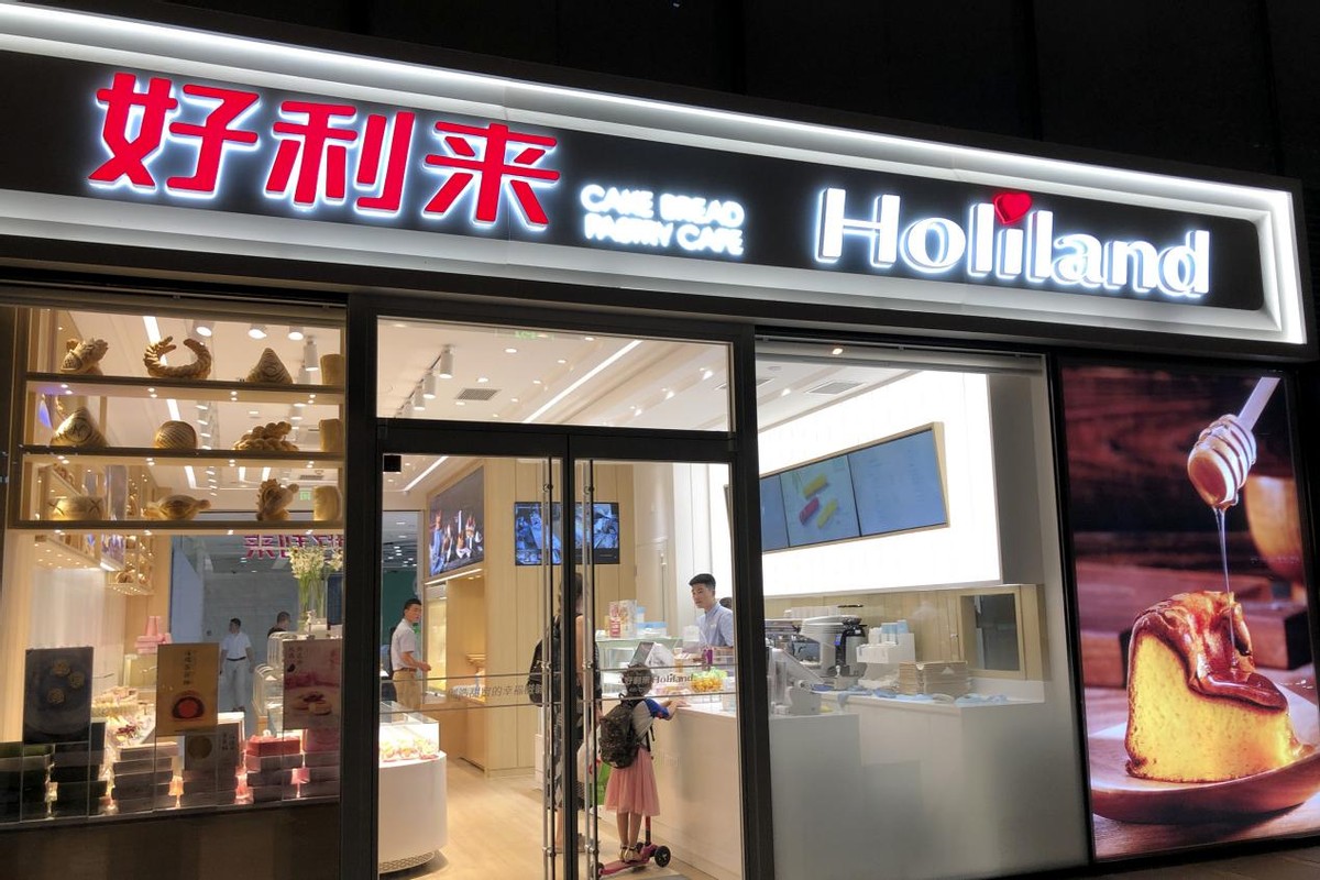 好利来老板罗红和江一燕,好利来老板的事迹