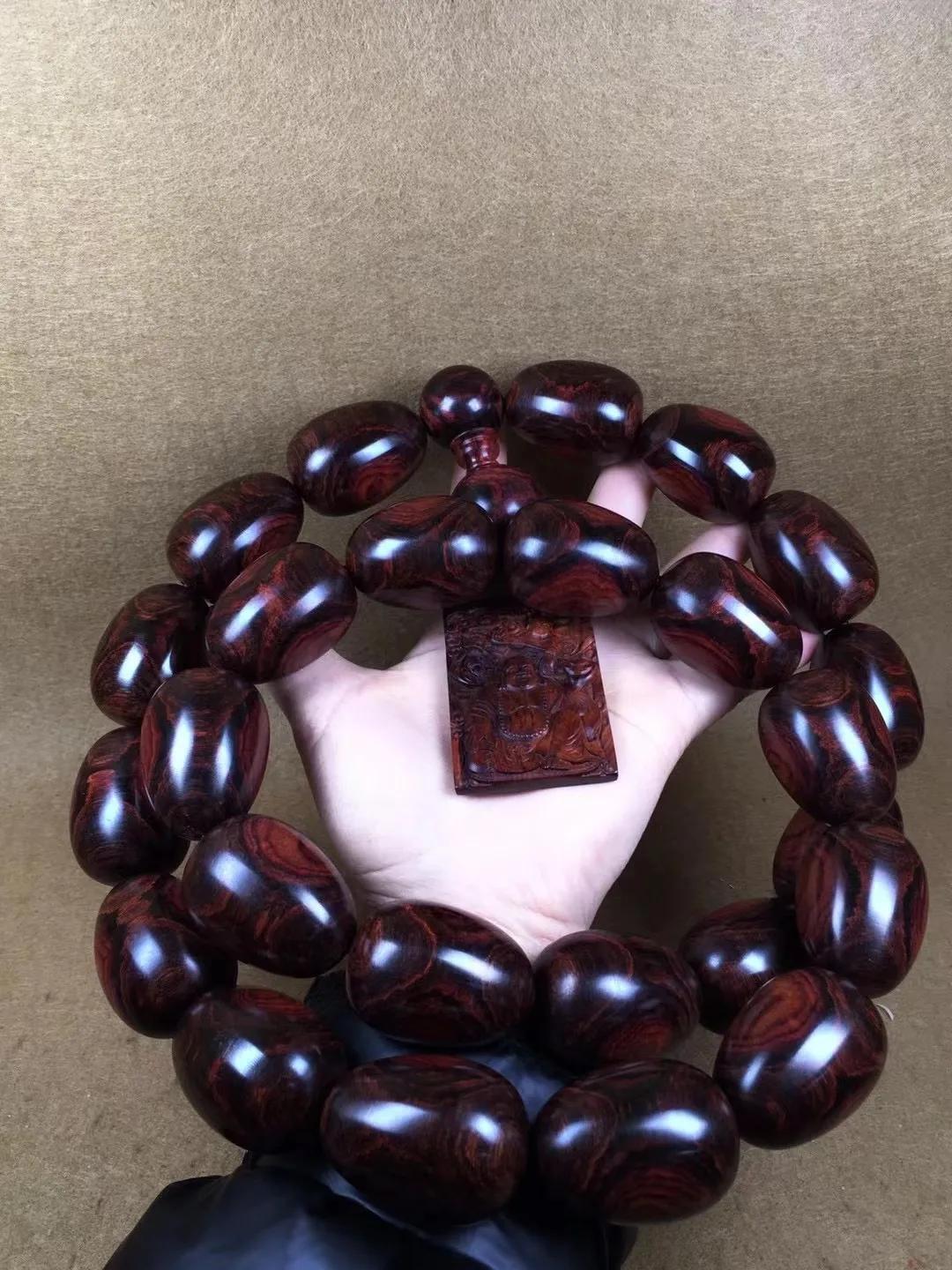 顶级海南黄花梨鬼脸手串,海南黄花梨手串一串多少克