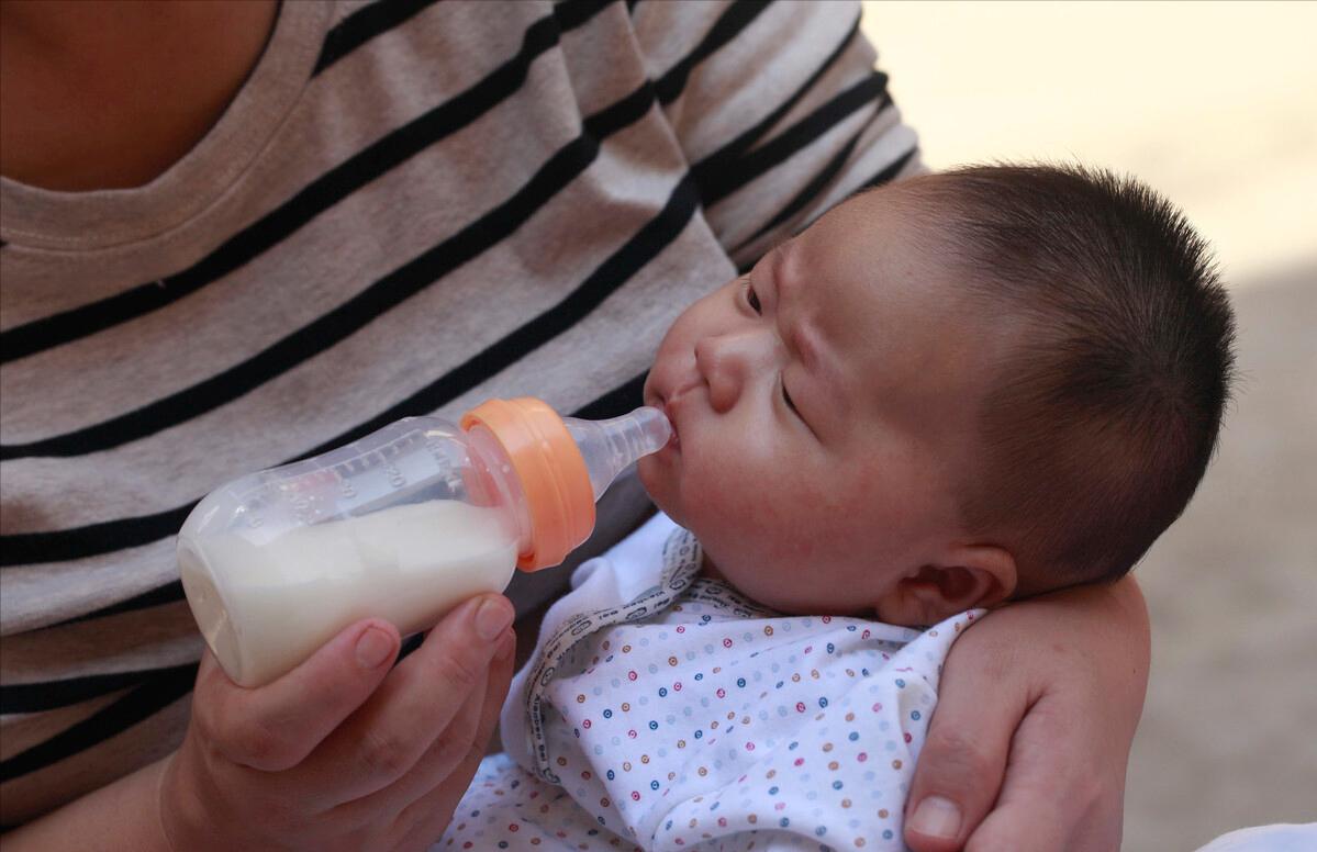 冲奶粉水温超过55度还有效果吗,冲奶粉时水温是多少度合适