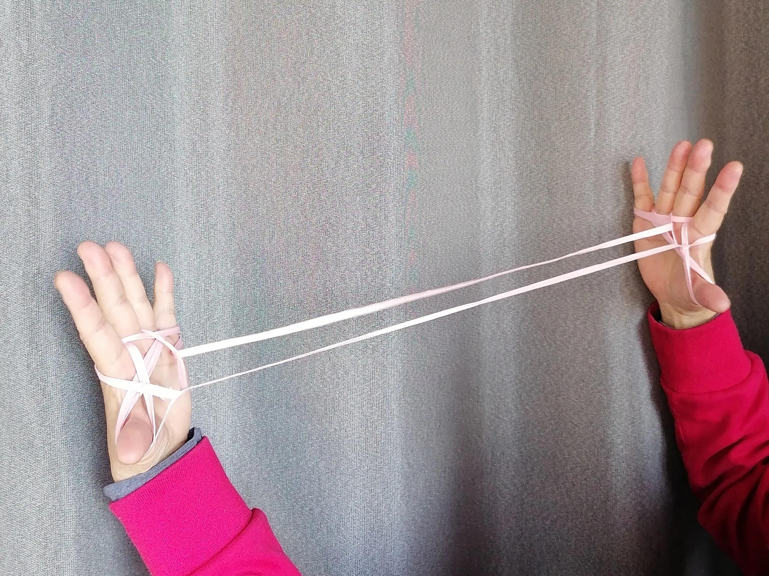 翻花绳游戏过程100字,两人玩的翻花绳游戏小技巧