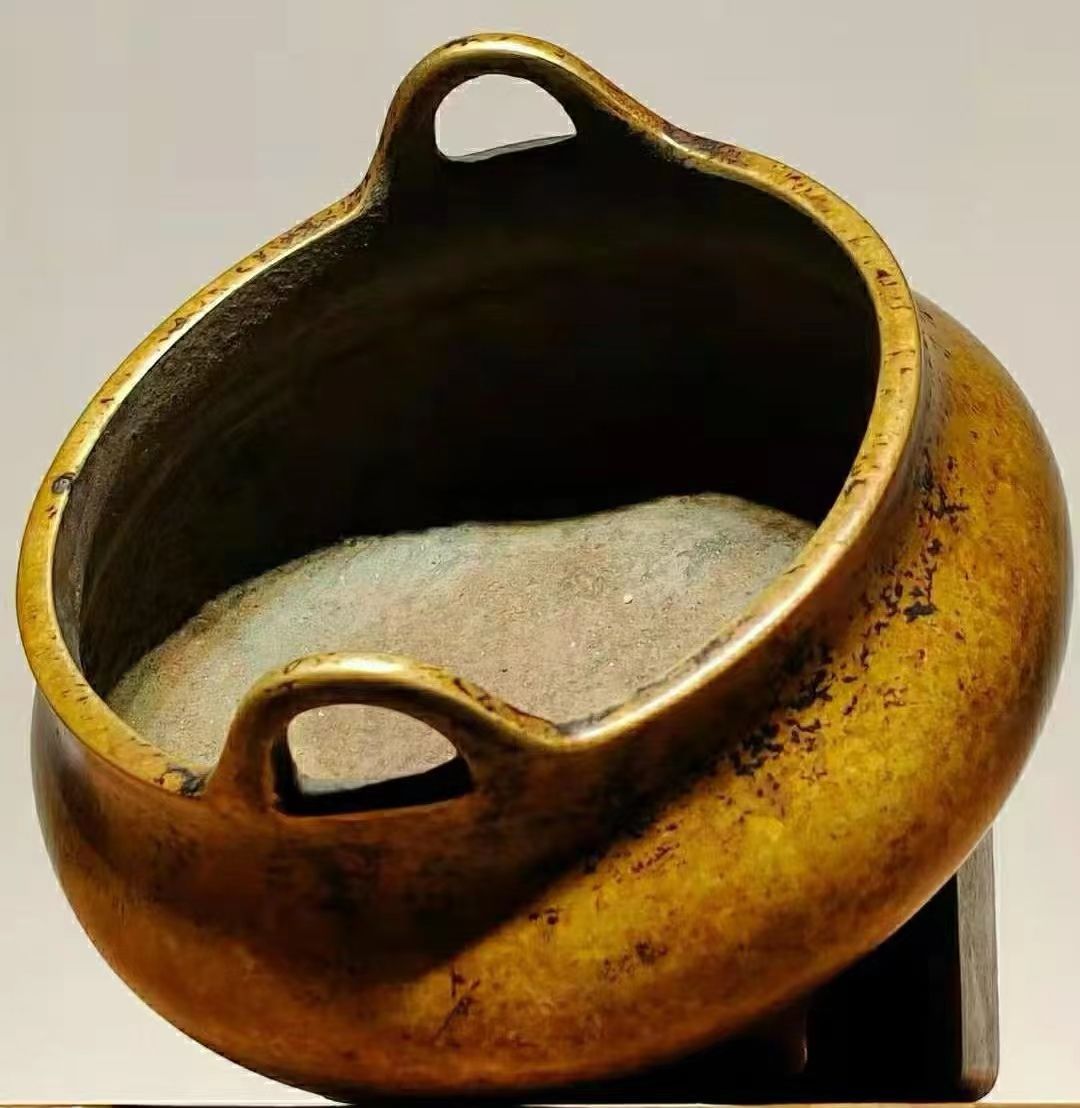 宣德炉黑漆古皮形成原因,珠光宝色的宣德炉